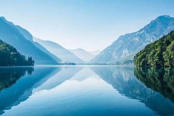 Tranquil lake mirroring a serene mountain landscape untouched by time