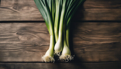 fresh and organic leeks, on old wooden desk


