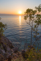 Obraz na płótnie Canvas sunrise over croatian rocky coast, Moscenicka Draga