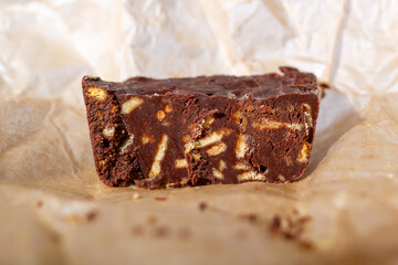 Chocolate salami dessert made from cocoa and broken biscuits