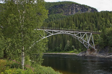 Railway bridge over the river Namsen in Namsentunet at Grong in Norway, Europe
