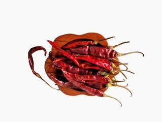 The white background in the picture is a bunch of dried red chilies, made from fresh, ripe red...