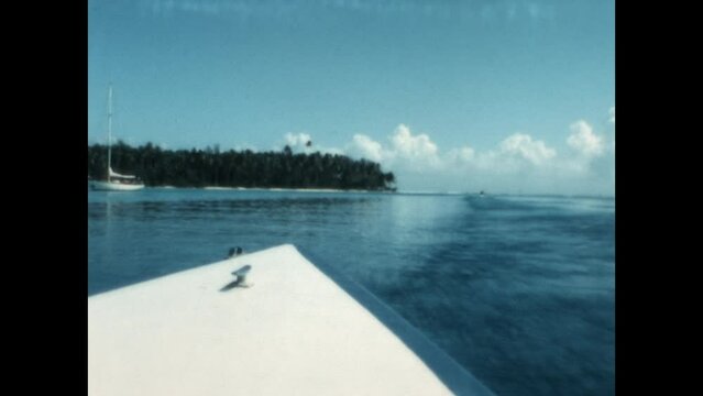 Treveling on an Outrigger 1971 - First person view from an outrigger boat traveling to a remote beach on the island of Tahiti, in French Polynesia, in 1971. 