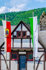 house on the hill with flags in front of it, Altena, Germany 