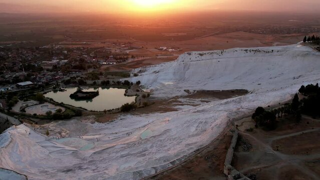 Aerial view of the travertines in Pamukkale, Turkey. White limestone mineral formations