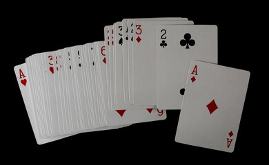 Playing cards for poker and gambling, isolated on black background, clipping	