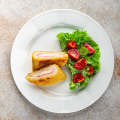 cutlet cordon bleu chicken meat, ham slice, cheese fresh food tasty eating cooking appetizer meal food snack on the table copy space food background