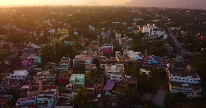 Aerial view of Nagercoil town, Kanyakumari District showing cars on streets, trees and buildings