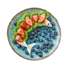  a plate decorated with slices of strawberry and kiwi fashioned into the shape of a playful dolphin...