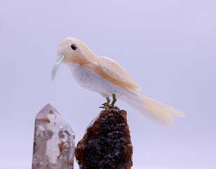 Colibri carved in stone