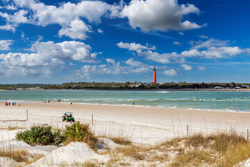 Beautiful beach and Lighthouse Ponce de Leon Inlet from New Smyrna beach, Florida.
