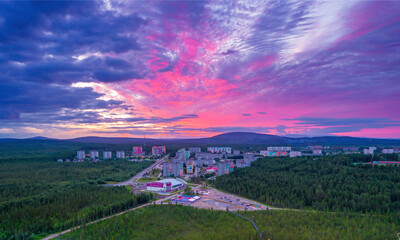Summer pink polar sunset in the city of Polar Dawns, Polyarnye Zori, Murmansk region.