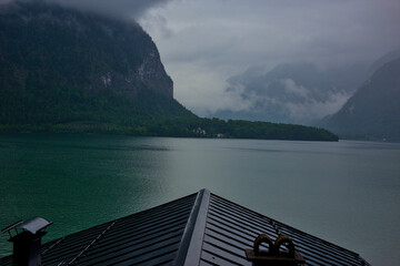 Hallstatter lake near Hallstatt village with cloudy sky in Austrian Alps. Natural colorful evening...