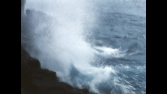 Crashing Waves on Tahiti 1971 - Waves crash against a rocky shore on the island of Tahiti, in French Polynesia, in 1971. 
