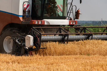 Close up of combine harvester for harvesting wheat.