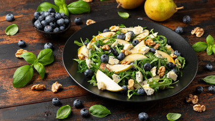 Pear Gorgonzola cheese, blueberries and Walnut Salad. Healthy food