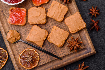 Delicious nutritious sandwiches with peanut butter, strawberry jam