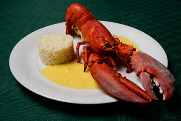 Lobster a la Newberg Red Cooked  American Seafood Dish with Rice and a Sherry or Cognac Cream Sauce, also spelled Newburg or Newburgh
