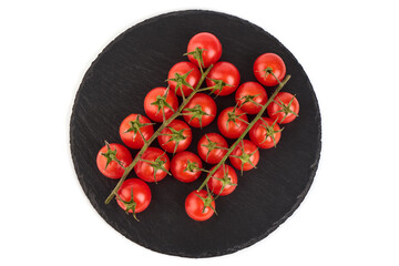 Heap of fresh cherry tomatoes, isolated on white background.