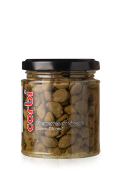 Kyiv, Ukraine. February 18, 2024.  Marinated capers Corbi Alcaparras en vinagre Royal in a glass jar on a white background