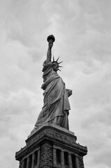 Statue of Liberty on the background of sky, New York City. Black and white image. - 739501778