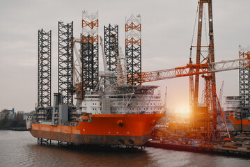 Wind Turbine Installation Vessel. Self-Elevating Vessel In The European Port During The Repairs On...