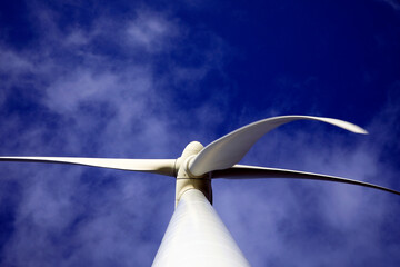 A windturbine and a blue sky