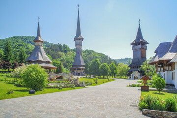View of Barsana Wooden Monastery site in Maramures County, Romania. - obrazy, fototapety, plakaty