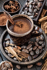 Cocoa drink on  wooden rustic background