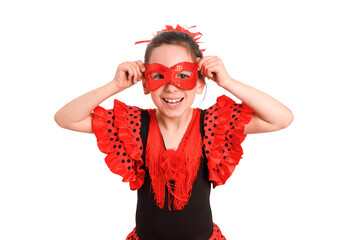 A little girl in a red Spanish dress and a carnival mask. Purim.