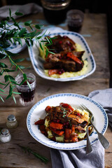 red wine cranberry braised short ribs.selective focus.style rustic.