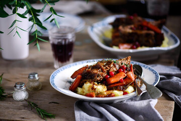 red wine cranberry braised short ribs.selective focus.style rustic.