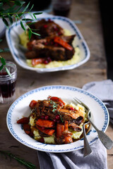 red wine cranberry braised short ribs.selective focus.style rustic.