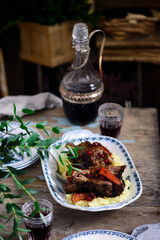 red wine cranberry braised short ribs.selective focus.style rustic.