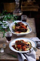red wine cranberry braised short ribs.selective focus.style rustic.