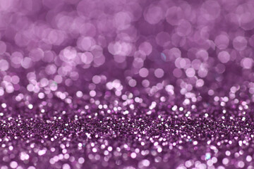 Abstract shiny lilac background made of glitter.