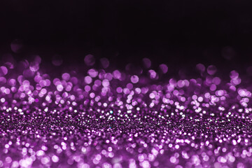 Abstract shiny lilac background made of glitter.
