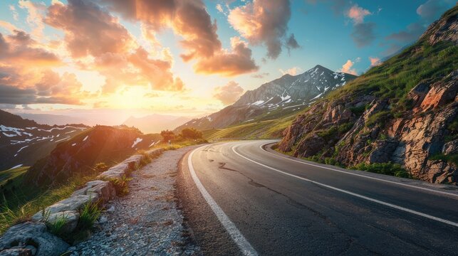 Mountain road at colorful sunset in summer. Dolomites, Italy. Beautiful curved roadway, rocks, stones, blue sky with clouds. Landscape with empty highway through the mountain pass in spring. Travel