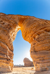 Arch of sandstone elephant rock erosion monolith standing in the desert, Al Ula, Saudi Arabia