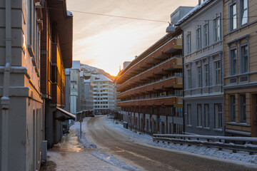 Typical houses in Bergen at winter, cold winter day on the downtown  streets of Bergen, snow...