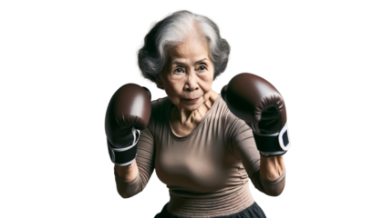 Elderly Asian woman with boxing gloves poised and ready, exuding strength and determination. Transparent background.