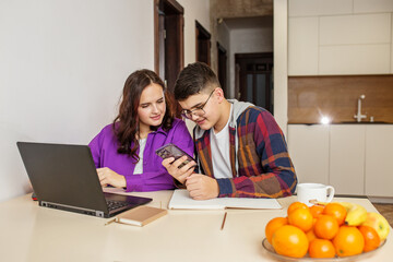 Teenagers Reviewing Content on Smartphone for Study