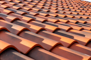 Orange colored classic corrugated roof tiles
