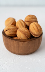 Cookies Nuts with condensed milk and nuts. Fresh homemade cookies in a shape of nuts 