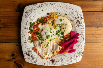 Poached eggs in tomato sauce and spices
