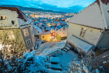 Beautiful evening panorama of Bergen, looking from above between the houses. Looking down between...