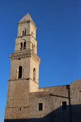 Fototapeta na wymiar Bell tower of the church of San Domenico di Putignano, Puglia, Italy