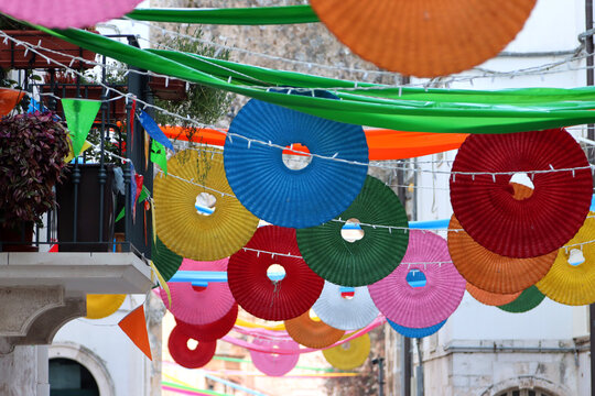 Streets of the historic center of Putignano, adorned with festoons for the carnival. Puglia, Italy
