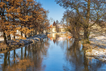 Fototapeta na wymiar Svihov castle surrounded by a moat in winter, medieval landmark in Region Pilsen in Czech Republic, Europe.