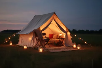 Abwaschbare Fototapete the rustic camper tent with candle lit in summer evening © Michael Böhm